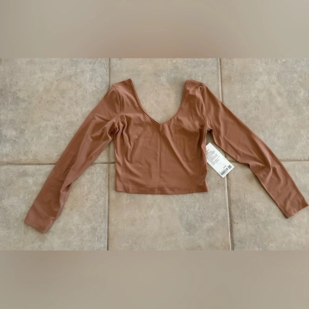 lululemon athletica retired scoop 	•	iconic